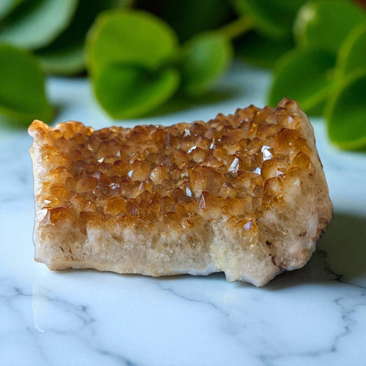 Citrine on white marble top