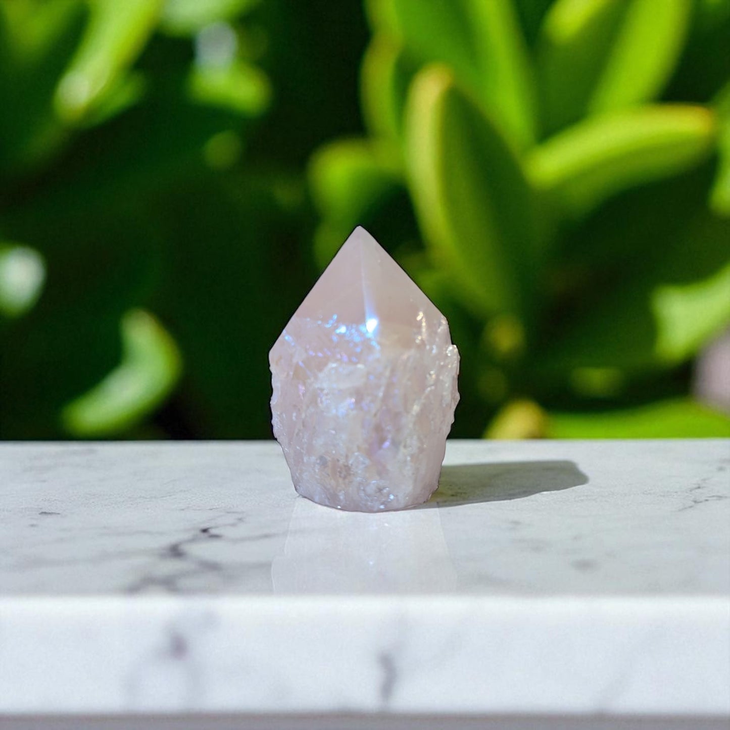 Rose Aura Quartz Point - 8.5cm x 6cm on marble