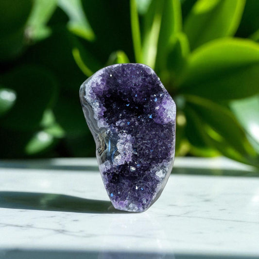 Amethyst - 10cm x 7cm on marble top