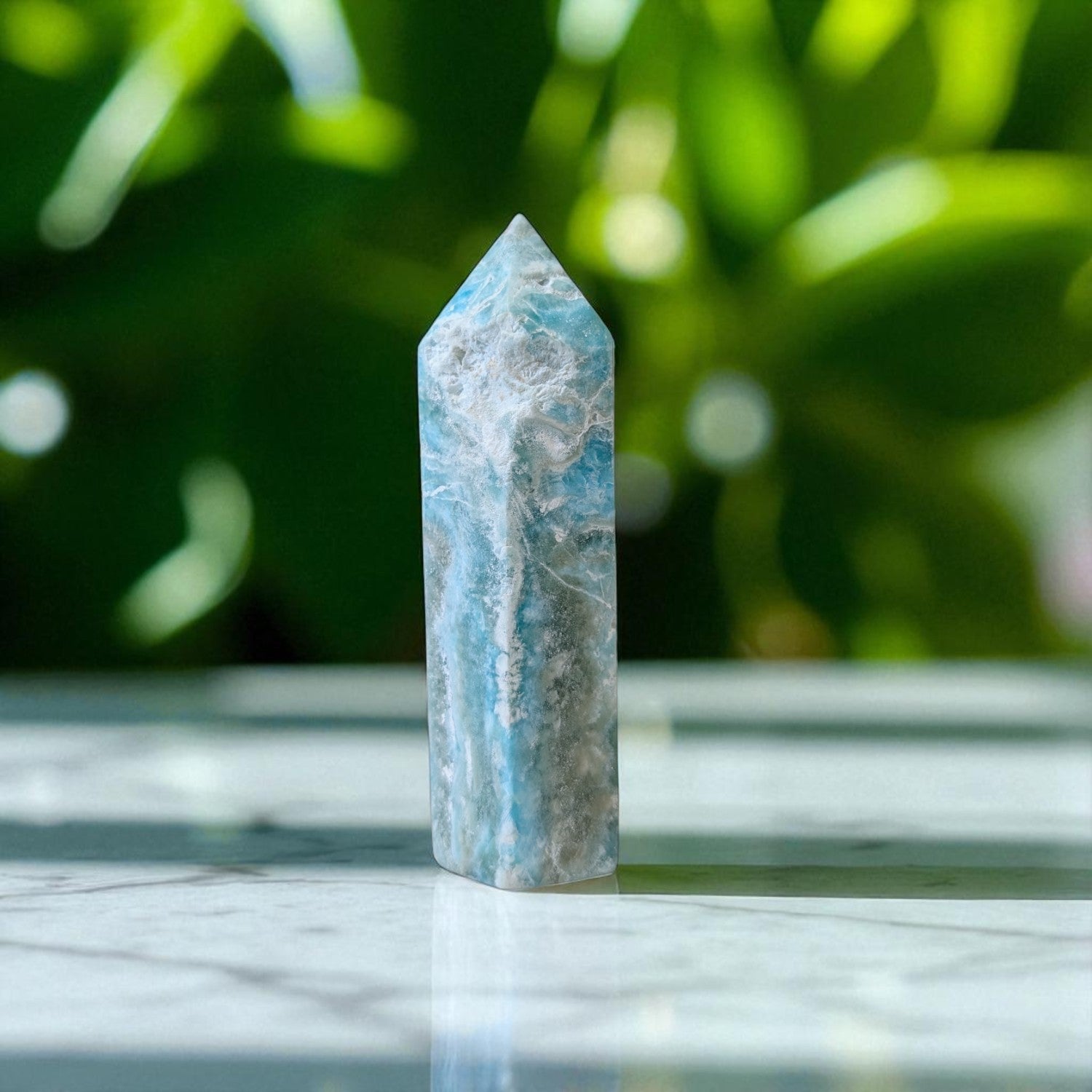 Caribbean Calcite Obelisk- 12 cm x 4cm on marble top 2