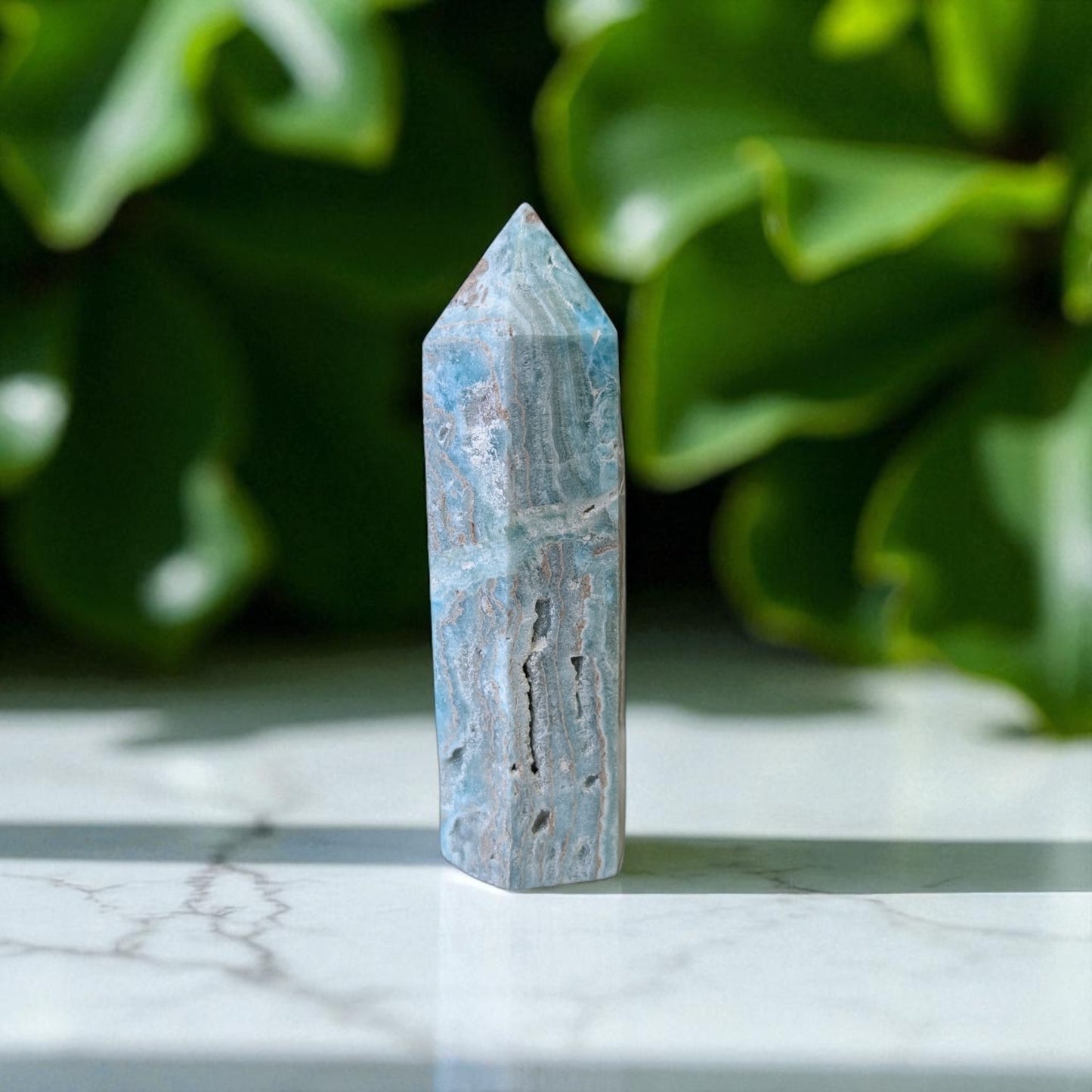 Caribbean Calcite Obelisk- 12 cm x 4cm on marble top 3