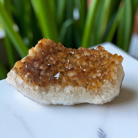 Citrine on white marble top