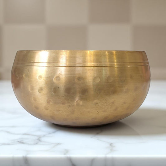 Hammered singing bowl