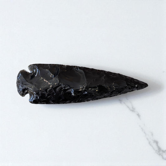 Black Obsidian Arrowhead - 13cm x 4cm on marble