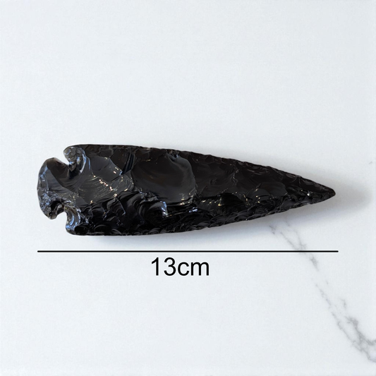 Black Obsidian Arrowhead - 13cm x 4cm on marble with size