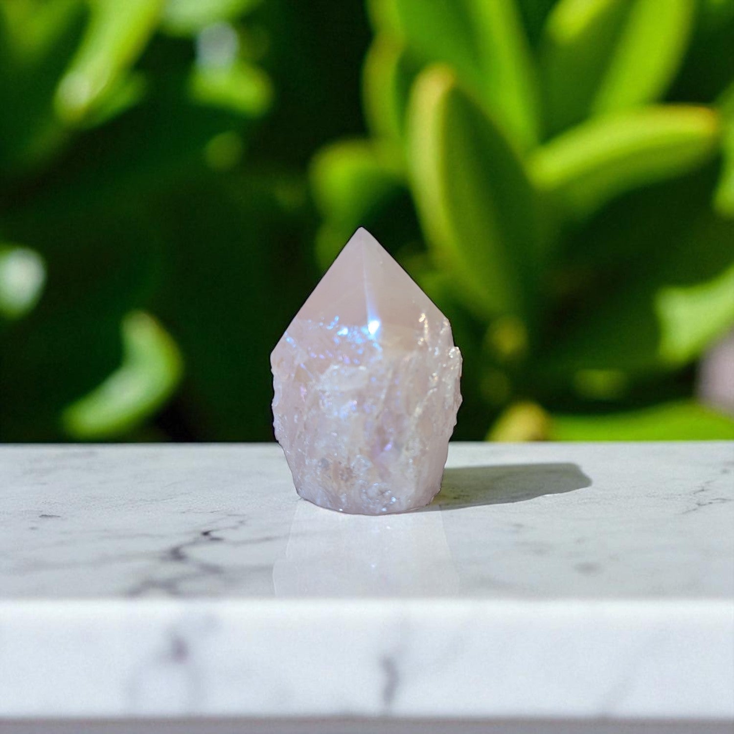 Rose Aura Quartz Point - 8.5cm x 6cm on marble