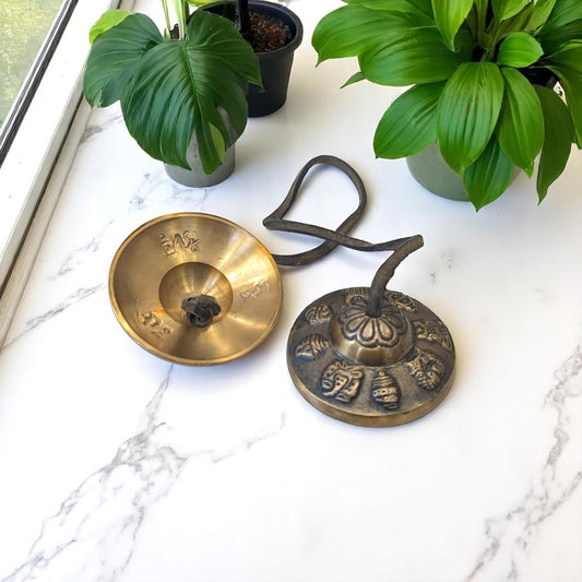Tingsha bells on marble
